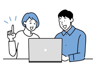 夫婦がパソコンで調べる様子