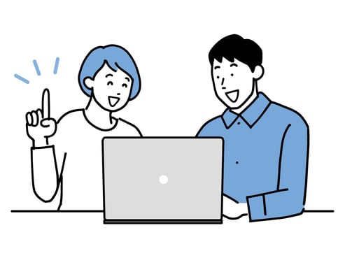 夫婦がパソコンで調べる様子