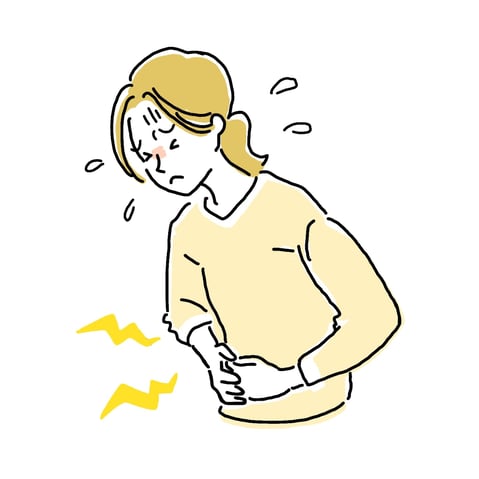 お腹が痛い女性
